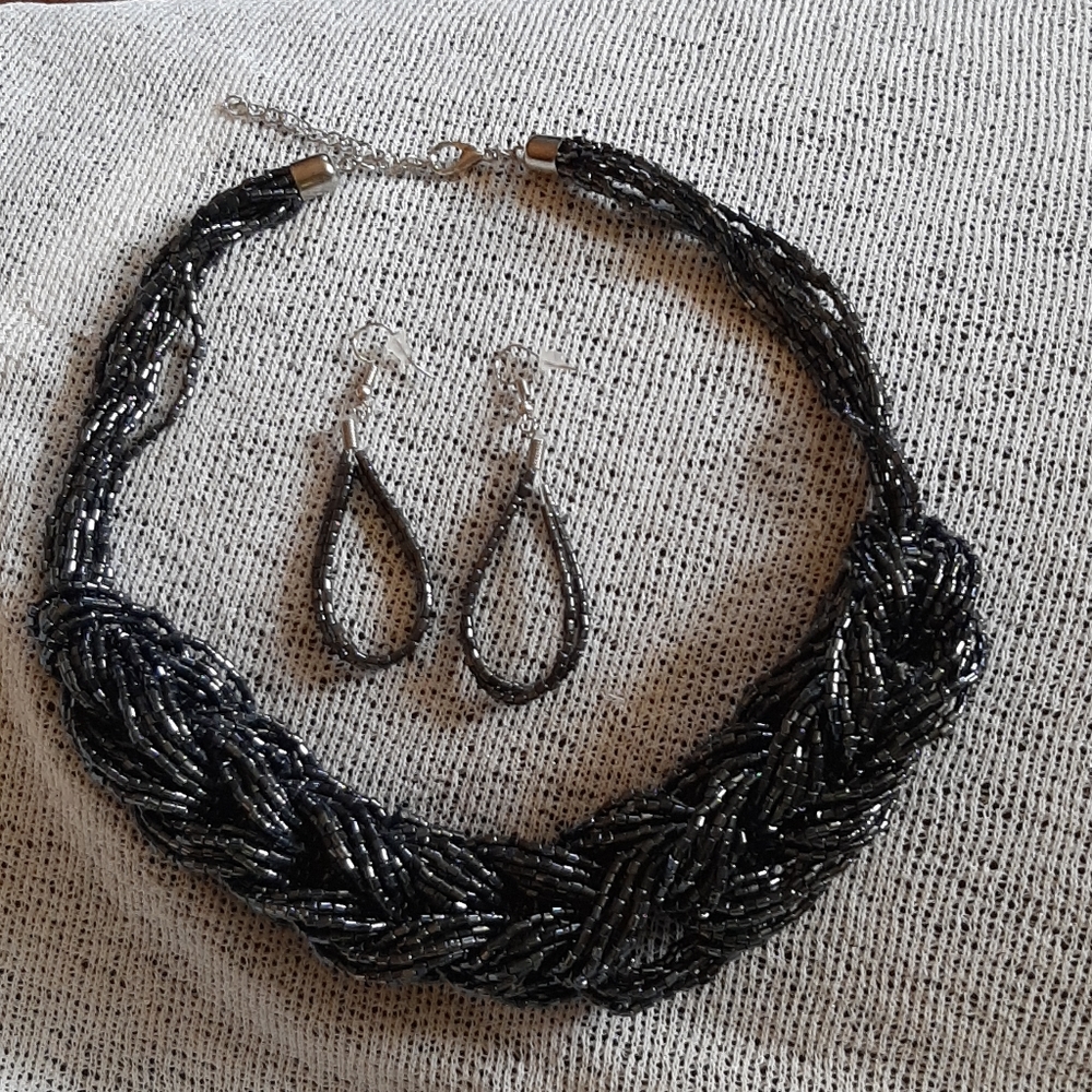 Gun metal blue necklace & earrings.